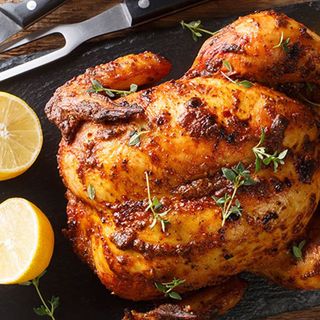 Pollo entero al ast y patatas