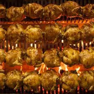 Medio pollo a la leña