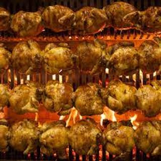 Medio pollo a la leña