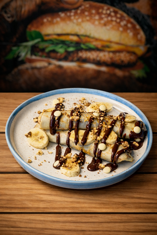 Млинці з начинкою зі свіжих бананів та шоколадного ганашу