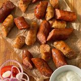 Ковбаски на грилі