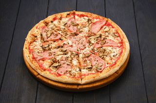 Pizza Reine ملكة البيتزا