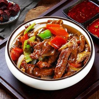 Ternera con salsa de pimienta negra