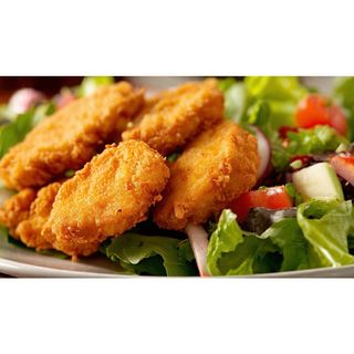 Chicken Nuggets Served With Salad