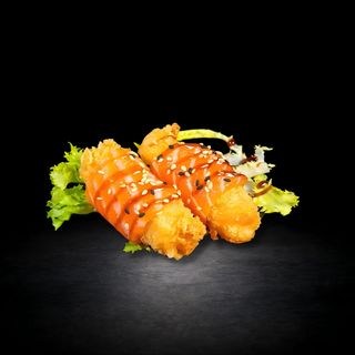 126. Rotllet De Salmó Amb Llagostí I Salsa D'Anguila (2 Uds.)