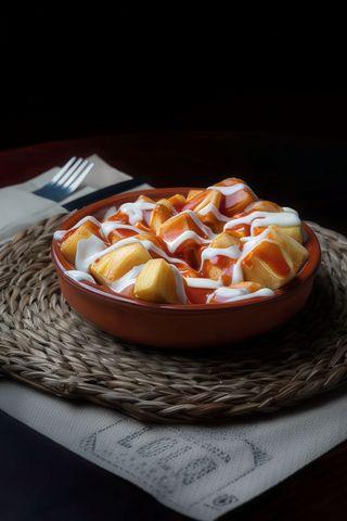 Ración De Patatas Bravas