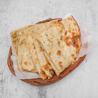 91. Butter Naan  (Contiene Gluten)