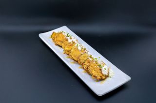 Melanzane fritte con miele e pecorino al tartufo