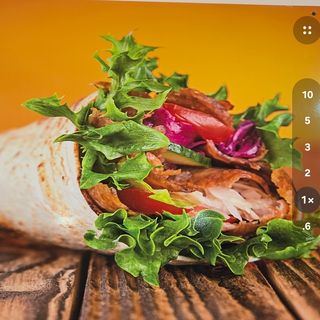 Rollo De Ternera Con Patatas Y Ensalada