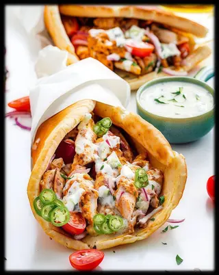 Tandoori chicken tikka stuffed naan bread and jalapeño