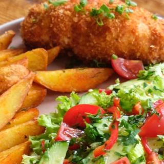 Country style potatoes 150gr+ cotlet homemade 60gr+vegetables salad   