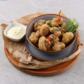 Печериці в хрумкій паніровці (245г)