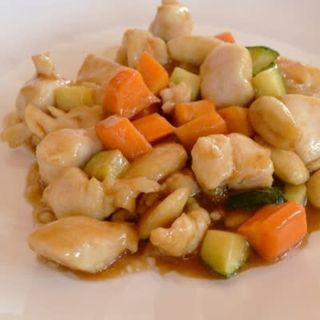 63. Pollo con mandrole e peperoni