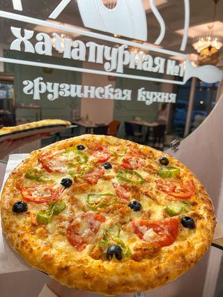 Пицца с телятиной