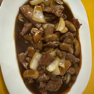 Vaca com cogumelos