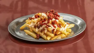 Patatina con salsa cheddar e bacon
