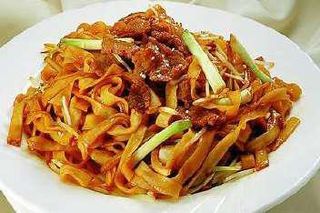 Tagliatelle saltate con vitello e verdure