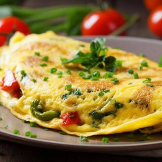 Омлет з сиром і помідором