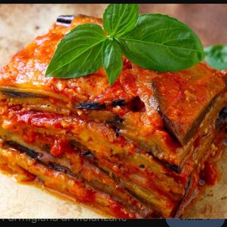 Parmigiana di melanzana - a porzione
