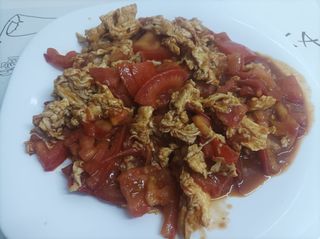 47. Пържени яйца със задушени домати (600гр)