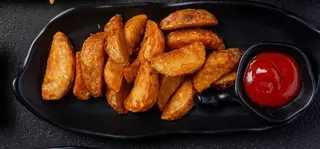 Картофель по-деревенски  (130гр)