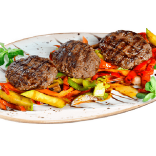 Еленски кюфтета върху канапе от сотирани зеленчуци (350г)