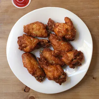 25. Alitas de pollo (8 uds.)