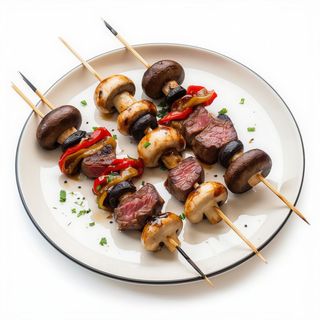 Pinchos Morunos Con Champiñones