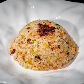 1069 RISO SALTATO CON WAGYU E TARTUFO NERO