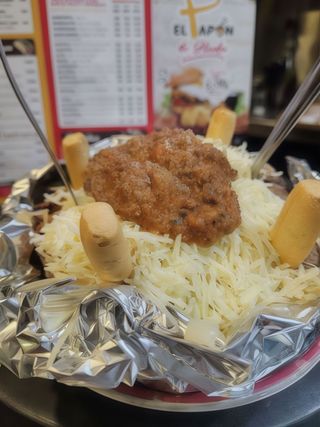 Papas A La Boloñesa