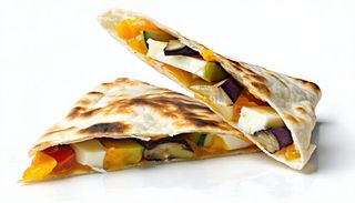 Piadina con melanzane, zucchine, brie e salsa funghi