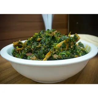 1 plate of Vegetable soup with swallow and  Protein