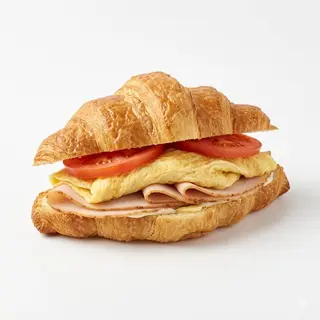 Croissant De Pavo Con Tortilla Francesa Y Tomate