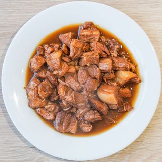 41.Карамелизирано свинско месо върху бял ориз(500г)