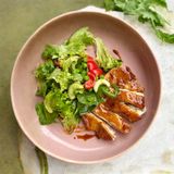 Chicken thigh in teriyaki sauce with fresh salad