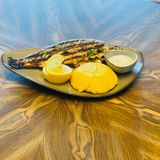 Păstrăv cu mămăligă și usturoi -400 g