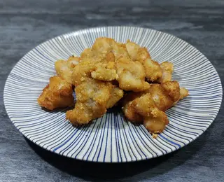 Pechuga de pollo rebozado con patatas