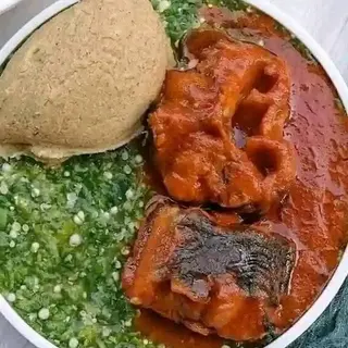 White Eba served with okro mixed with catfish