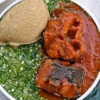 White Eba served with okro mixed with catfish