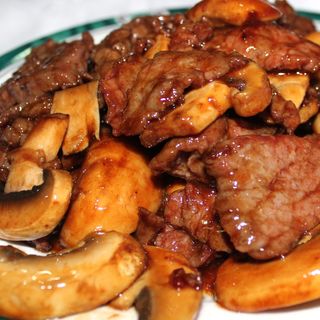 Ternera con champiñones