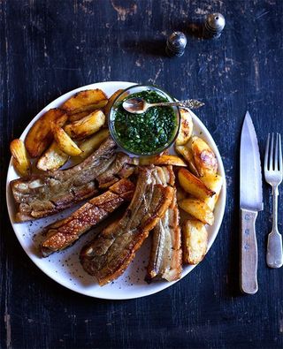 2 Roasted pork ribs with wedges, avocado & kachumbali