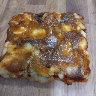 Pizza pesto siciliano (porción)