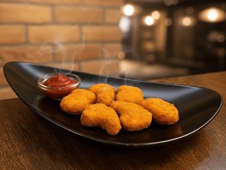 Курячі нагетси з кетчупом