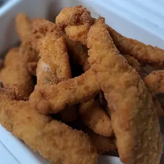 Tiras de pollo empanado cajún. 250grs.