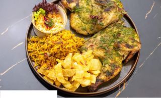 Whole Chicken with Chips and rice plus a Free Soda