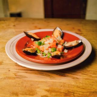 Tapa De Aliños Con Mejillones En Piriñaca