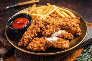 Куриные стрипсы с кортофелем 0.5 (450г)