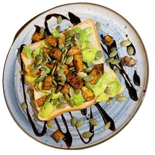 Tostada de pasta de aguacate, tofu y semillas de calabaza (2 Uds.)