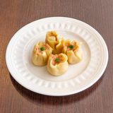 16) Ravioli di gamberi shao-mai al vapore