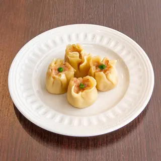 16) Ravioli di gamberi shao-mai al vapore